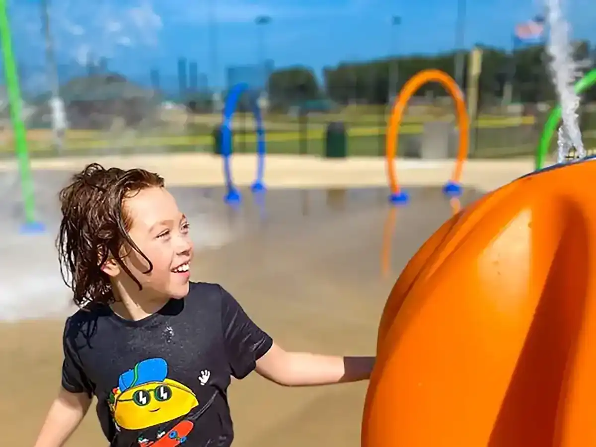 A child having fun at Atoka Splash Pad