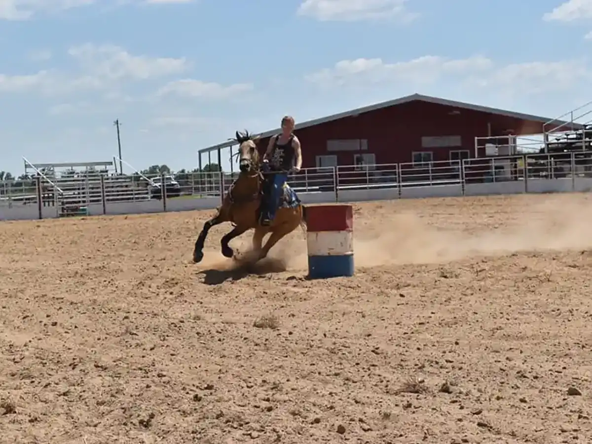 The horseback rider on a barrel racer at Atoka, OK